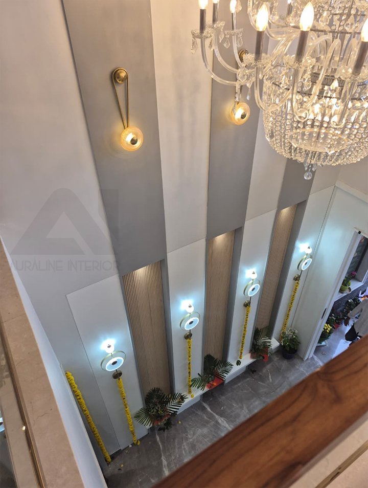 Modern interior wall and lighting design by Auraline Interior